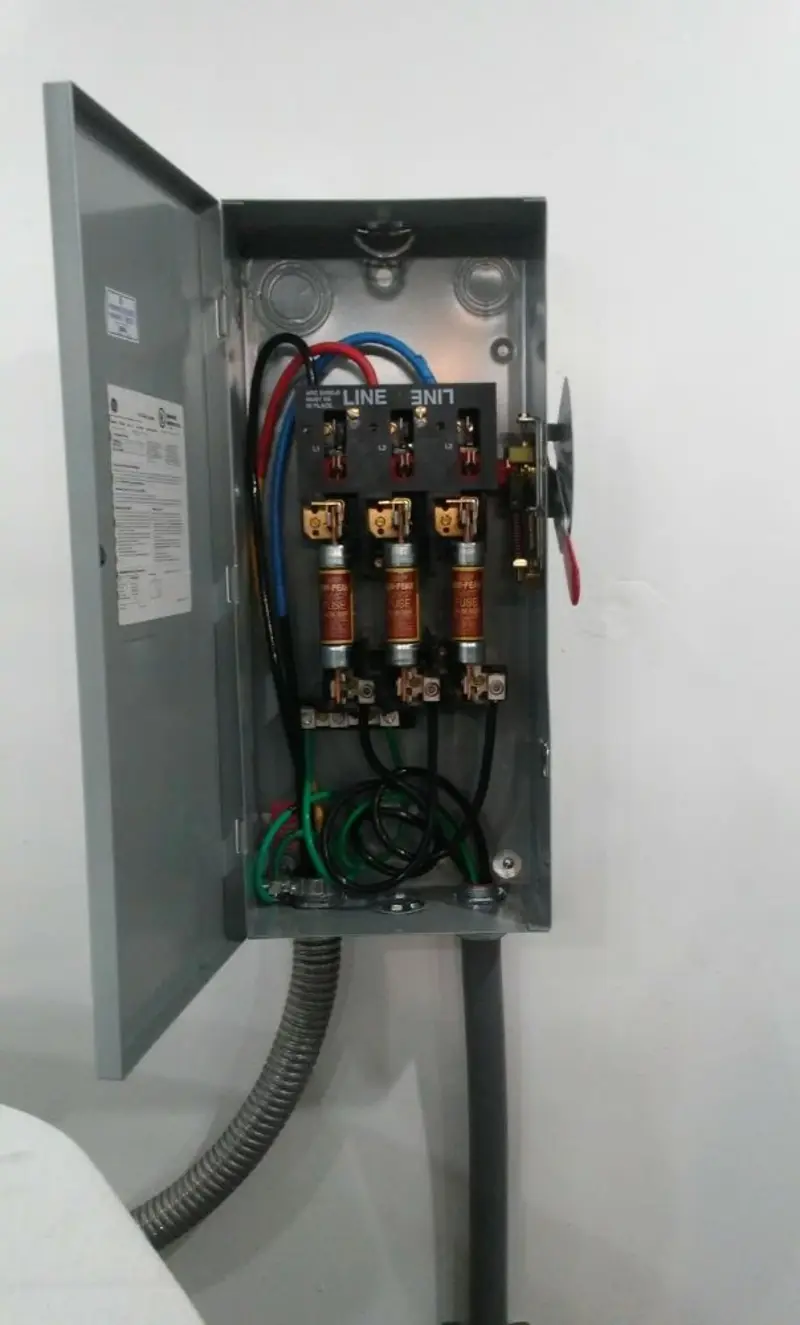 Three-phase disconnect switch installed for Smoke Detector Installation in Williams